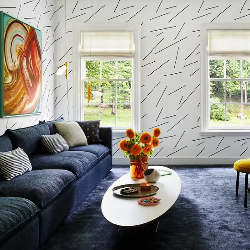 A textured navy blue indoor carpet in a living room.
