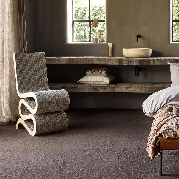 Plush, dark chocolate brown wall-to-wall carpeting.