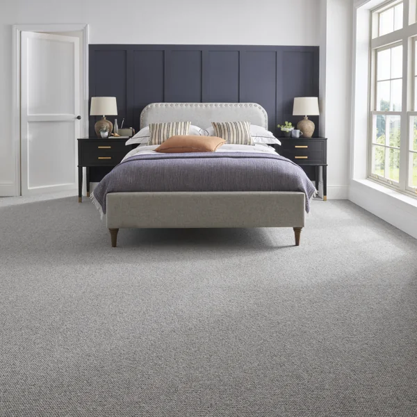 textured grey carpet in a contemporary bedroom